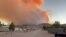 FILE - Fire and smoke rise from the Silver King Fire in Marysvale, Piute County, Utah, U.S., July 6, 2024 in this screen grab obtained from a social media video. (Trevor Urry/via Reuters) 