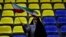 A supporter of a group of candidates waves an Iranian flag during an election campaign rally ahead of the March 1 parliamentary elections, in Tehran, Iran, Feb. 28, 2024. 