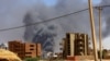 FILE - Smoke rises above buildings after an aerial bombardment during clashes between Sudan's Army and the paramilitary Rapid Support Forces, in Khartoum, Sudan, May 1, 2023. 