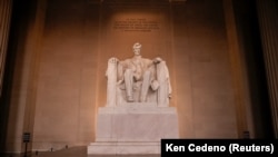 The statue of President Abraham Lincoln at the Lincoln Memorial.