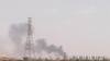 FILE - A picture taken from Omdurman shows smoke billowing north of Khartoum, Sudan, July 22, 2023, as fighting between the country's army and a rival military faction continues.