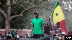 FILE - Opposition leader, Ousmane Sonko, looks on during a meeting in Ziguinchor on May 24, 2023. Thousands of supporters gathered in Ziguinchor against his arrest during a rape trial.