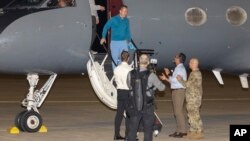 (FILE) Freed American Eyvin Hernandez exits a State Department plane after he and nine fellow detainees were released in a prisoner swap deal between U.S. and Venezuela.