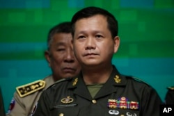 Cambodian army chief Hun Manet, a son of Cambodian Prime Minister Hun Sen, attends a ceremony of the Royal Cambodian Armed Forces at the Defense Ministry in Phnom Penh, Cambodia, Thursday, April 20, 2023.
