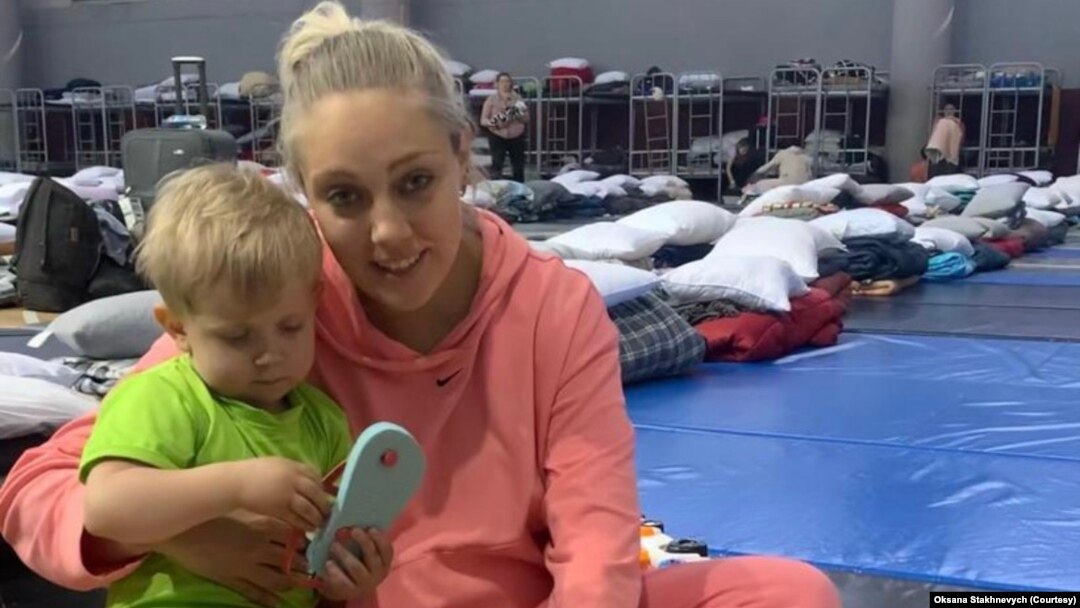 Oksana Stakhnevych, a Ukrainian refugee, and her son at a temporary shelter in 2022 where she stayed while on the Mexican-U.S. border. Courtesy of Oksana Stakhnevych. 