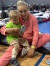 Oksana Stakhnevych, a Ukrainian refugee, and her son at a temporary shelter in 2022 where she stayed while on the Mexican-U.S. border. Courtesy of Oksana Stakhnevych. 