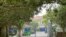 Buildings in the Shanghai Public Health Clinical Center stand near the entrance of the compound in Shanghai, April 30, 2024. Scientist Zhang Yongzhen staged a sit-in protest after authorities locked him out of his lab at the center.