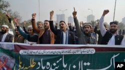 Members of Muslim Talba Mahaz Pakistan chant slogans at a demonstration to condemn Iran's strike in the Pakistani border area, in Islamabad, Jan. 18, 2024. 