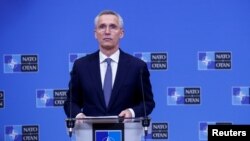 NATO Secretary-General Jens Stoltenberg holds a news conference ahead of a two day meeting of the alliance's defence ministers, in Brussels, Feb. 13, 2023. 