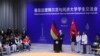 In this photo released by Xinhua News Agency, German Chancellor Olaf Scholz takes part in a dialogue with students at Tongji University's Jiading Campus in Shanghai, China, April 15, 2024. 