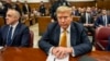 Former U.S. President Donald Trump sits in Manhattan Criminal Court in New York, May 21, 2024.