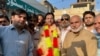 Supporters greet Fayaz Zafar as the VOA Deewa journalist is released from police custody in Pakistan's Swat Valley, Aug. 31, 2023. (Usman Khan/VOA Deewa)