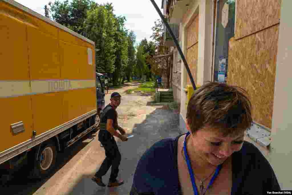 Svitlana Oleynikova, a post office manager, expects their branch may soon close for war in Kupiansk, Ukraine on Aug. 21, 2023 