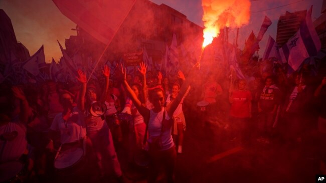 In Tel Aviv, Israel, Israelis protest plans by Prime Minister Benjamin Netanyahu's government to overhaul the judicial system, May 6, 2023