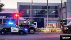 An Ontario, Canada, police station with police vehicles parked in front is seen in a photo from the Ontario Police Department's Twitter.