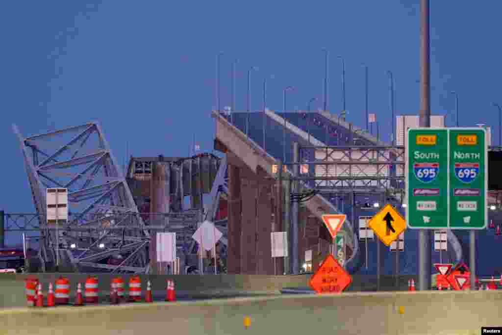 A general view shows the Francis Scott Key Bridge, as seen from the Baltimore side, following the bridge collapse, in Baltimore, March 26, 2024.