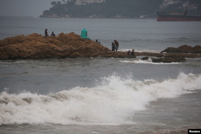 FILE - Waves break at the beach as Hurricane Otis barrels towards Acapulco, Mexico, October 24, 2023. (REUTERS/Javier Verdin)