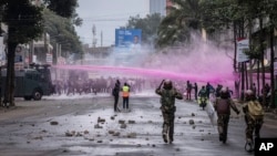 Police fire water canons during a protest in Nairobi, Kenya, July 16, 2024. 