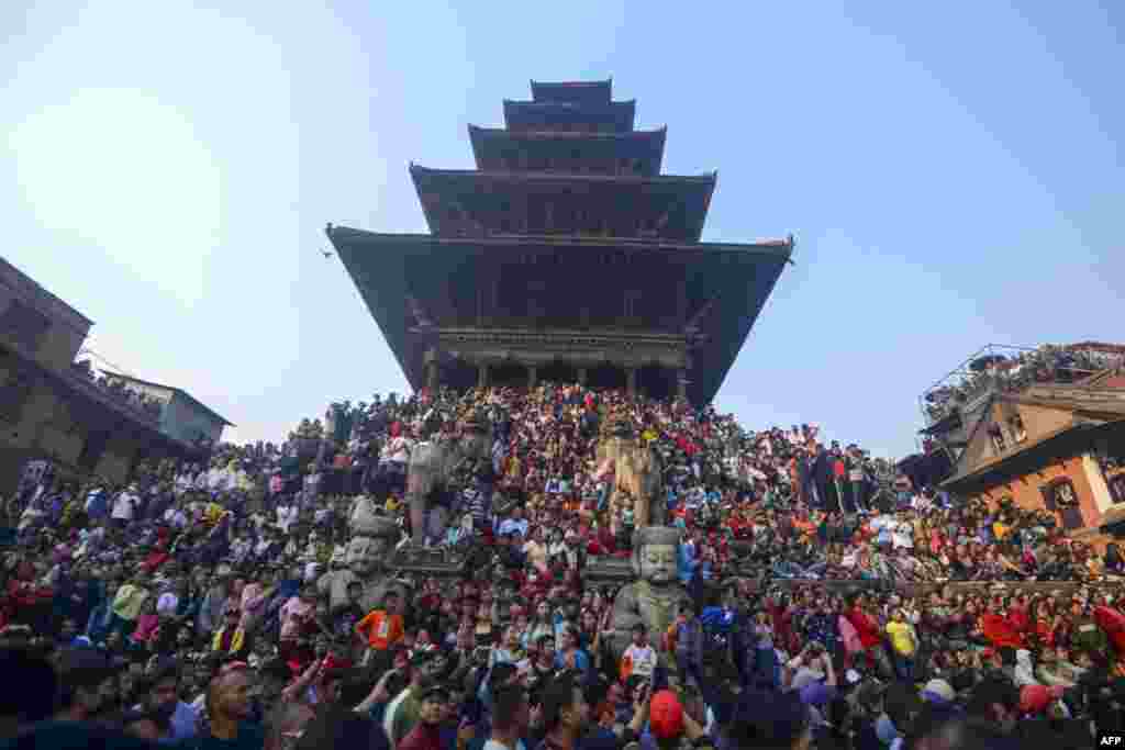 Hindu devotees gather during the Bisket Jatra festival held to mark the Nepalese New Year in Bhaktapur.