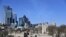 FILE - The Tower of London with the backdrop of the City of London, on March 24, 2020. 