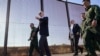 FILE - U.S. President Joe Biden walks along a stretch of the U.S.-Mexico border in El Paso Texas, Jan. 8, 2023. 