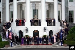 President Joe Biden and first lady Jill Biden welcome NATO allies and partners to the White House in Washington, July 10, 2024, during a ceremony on the South Lawn for the 75th anniversary of the alliance.