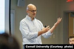 Chris Anderson teaches about AI and its use in revenue management for travel and hospitality companies. (Photo courtesy of Cornell University)