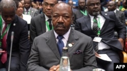 FILE - Gabon's President Ali Bongo Ondimba listens during a coordination meeting of the African Union, at the United Nations offices in Gigiri, Nairobi, Kenya, on July 16, 2023.