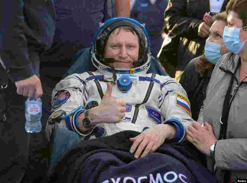 International Space Station (ISS) crew member and Roscosmos cosmonaut Sergey Prokopyev rests in a chair after landing in the Soyuz MS-23 space capsule in a remote area near Zhezkazgan, Kazakhstan. (NASA/Bill Ingalls/Handout via Reuters)