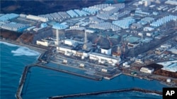 This aerial photo shows the Fukushima Daiichi nuclear power plant in Okuma town, Fukushima prefecture, north of Tokyo, on March 17, 2022. (Shohei Miyano/Kyodo News via AP, File)