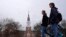 FILE - Students cross the campus of Dartmouth College in Hanover, New Hampshire, March 5, 2024. After months of delays and technical hiccups, some colleges and universities have started to receive federal data they need to put together financial aid offers for incoming students. 