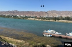 This is what's left of Syr Darya River in a good year, say residents of Khujand, Tajikistan, pointing to a river steadily shrinking, Sept 4, 2023.