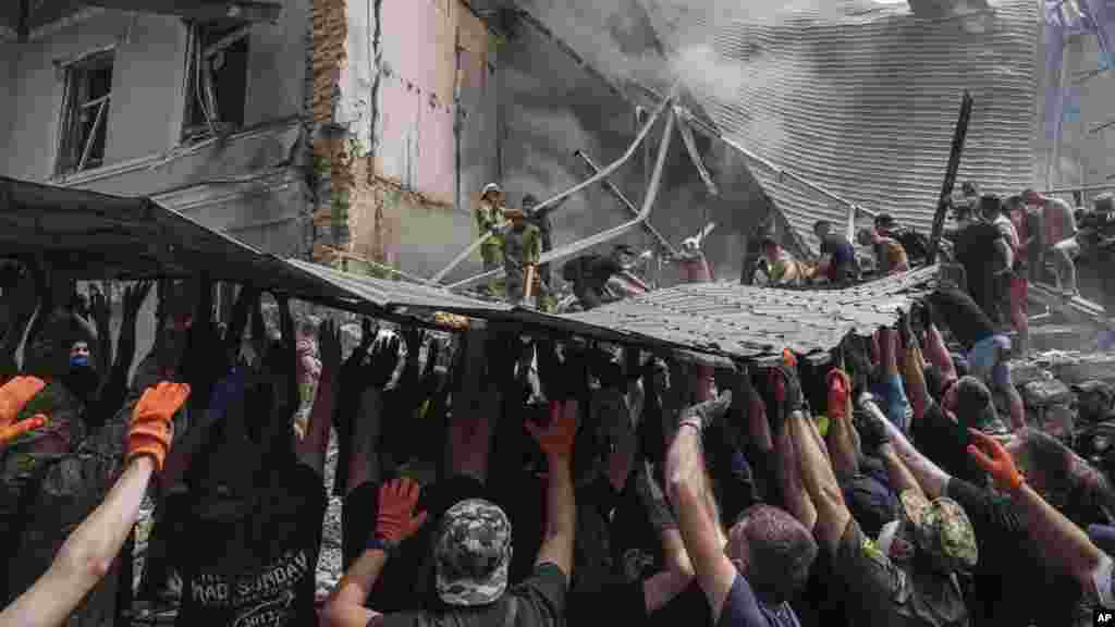 Emergency services personnel work at the site of Okhmatdyt children&rsquo;s hospital hit by Russian missiles, in Kyiv, Ukraine, July 8, 2024.