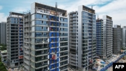 中国万科公司在浙江省杭州市开发的住宅楼楼盘。（2024年5月9日）