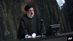 Iranian President Ebrahim Raisi speaks during a session of parliament in Tehran, Iran, April 30, 2023.
