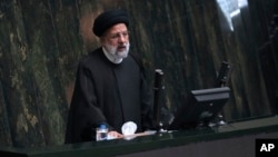 FILE - Iranian President Ebrahim Raisi speaks during a session of parliament in Tehran, Iran, April 30, 2023.