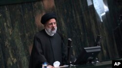 Iranian President Ebrahim Raisi speaks during a session of parliament in Tehran, Iran, April 30, 2023.