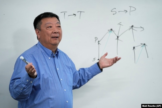 Dr. Pei Wang teaches an artificial general intelligence class at Temple University in Philadelphia, Thursday, Feb. 1, 2024. (AP Photo/Matt Rourke)