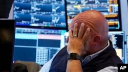 Trader Vincent Napolitano works on the floor of the New York Stock Exchange, Aug. 5, 2024.