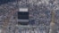 FILE - Muslim pilgrims circumambulate the Kaaba, the cubic building at the Grand Mosque, during the annual Hajj pilgrimage in Mecca, Saudi Arabia, June 17, 2024.