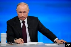 FILE - Russian President Vladimir Putin attends his annual news conference in Moscow on Dec. 14, 2023.