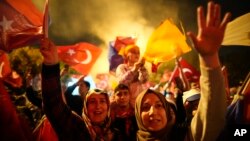 Supporters of Turkish President Recep Tayyip Erdogan celebrate in Istanbul, Turkey, May 28, 2023.