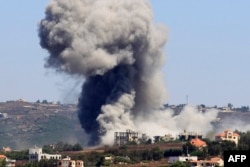 Smoke billows from the site of an Israeli airstrike in the southern Lebanese village of Jibbain on July 11, 2024.