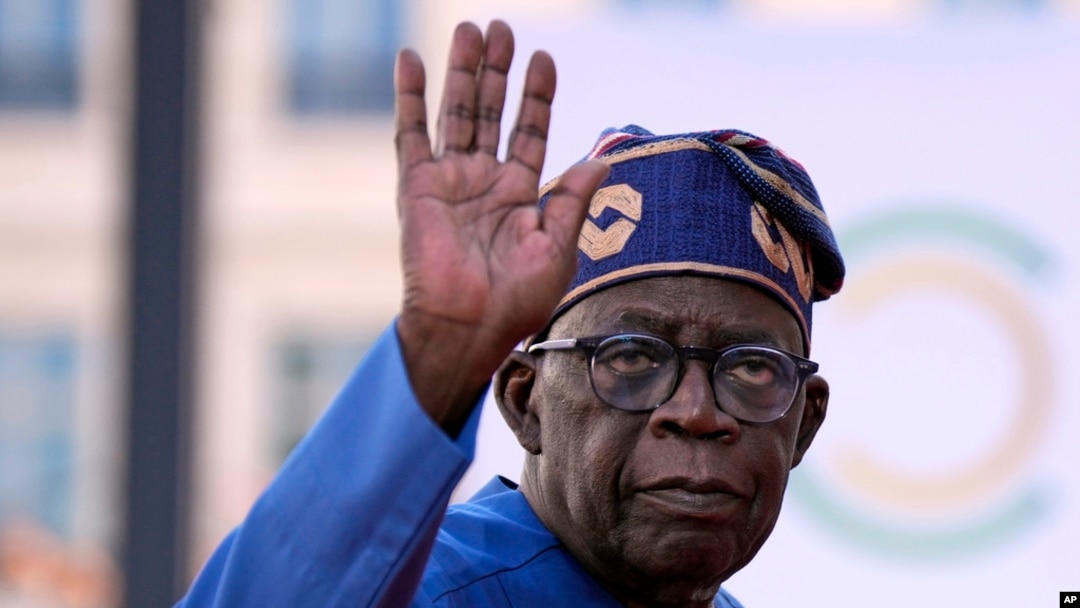 FILE - Nigeria's President Bola Tinubu arrives for the closing session of the New Global Financial Pact Summit, on June 23, 2023 in Paris.