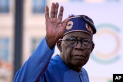 FILE - Nigeria's President Bola Tinubu attends a summit in Paris, on June 23, 2023.