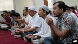 Indonesian Muslims pray for the safety of the Palestinian people during a Friday prayer at Abu Bakar Ashshiddiq Mosque in Jakarta, Indonesia, Oct. 13, 2023.