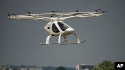 The Volocopter 2X, an electric vertical takeoff and landing multicopter, performs a demonstration flight during the Paris Air Show in Le Bourget, north of Paris, June 19, 2023.