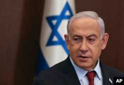 El primer ministro israelí, Benjamin Netanyahu, asiste a la reunión semanal del gabinete en la oficina del primer ministro en Jerusalén, el domingo 10 de diciembre de 2023.