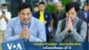 Vacharaesorn and Chakriwat Vivacharawongse, Thailand's King Maha Vajiralongkorn's sons, greet members of the media at Bangkok's Suvarnabhumi international airport on August 14, 2023.