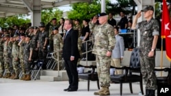 German Defense Minister Boris Pistorius, at left in front, is pictured at Camp Humphreys, the U.S. military headquarters in Pyeongtaek, south of Seoul, Aug. 2, 2024, during a ceremony where Germany officially joined the U.S.-led U.N. Command in South Korea.